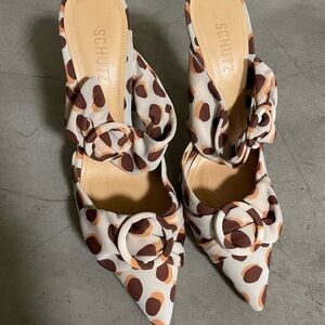 SCHUTZ polka dot pointed mules with buckle detail